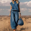 Retro Western-inspired Sleeveless Relaxed-fit Top Paired With High-waisted Wide-leg Jeans