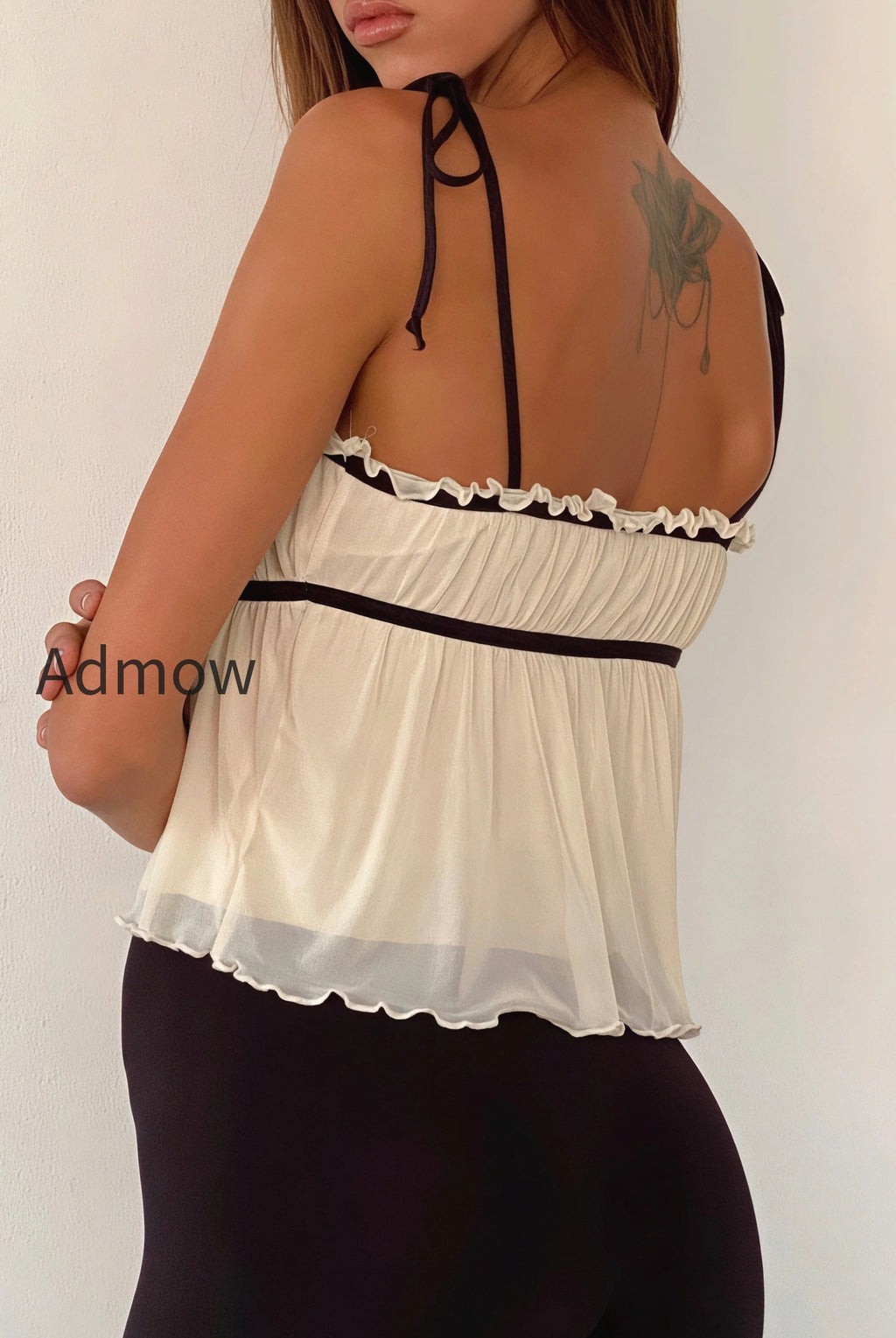 solid-ruffle-hem-tie-bow-cami-top